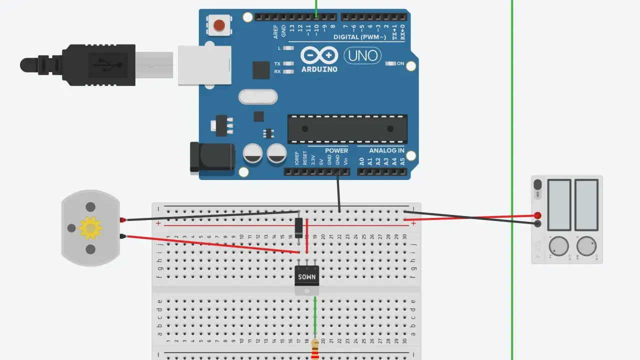 Circuito con Arduino Uno, un motore, un transistor IRFZ44N e un alimentatore.
