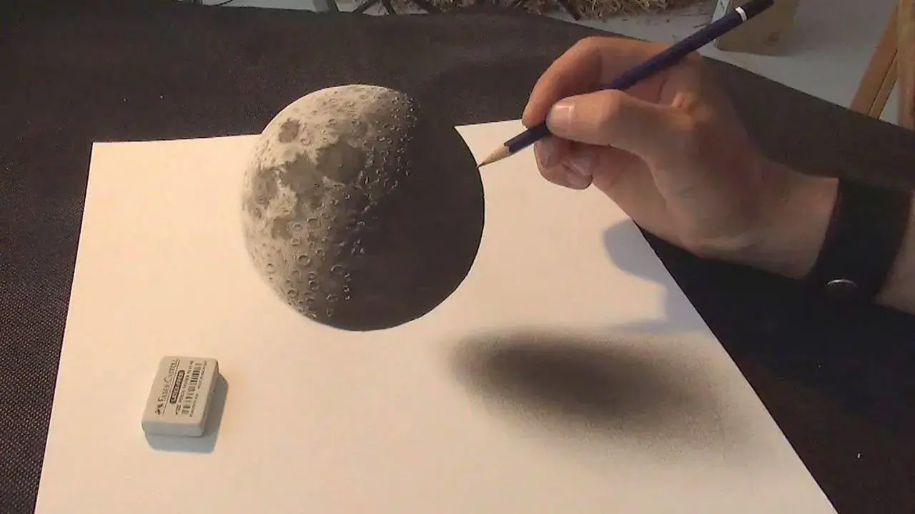 Un incredibile mano 3d disegno della luna, con un'ombra realistica che si proietta sulla carta.