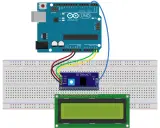 Arduino Uno collegato a un display LCD 16x2 tramite breadboard. Un modulo IIC LCM1602 facilita la connessione.