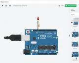 Un simulatore Arduino mostra una scheda UNO collegata via USB, con un LED e un resistore collegati.