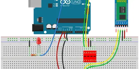 Circuito con Arduino Uno e modulo **arduino bluetooth** HC-05 collegati su breadboard, con LED e resistore.