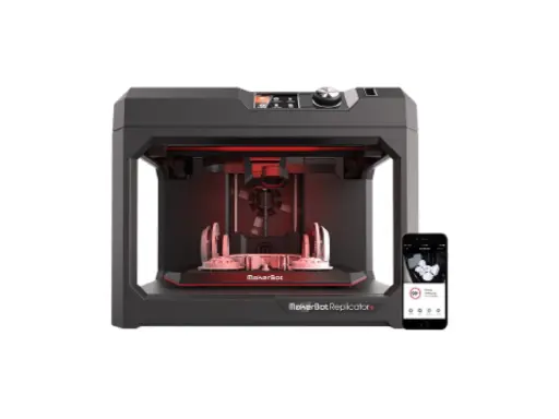 Stampante 3D MakerBot Replicator+ con smartphone che mostra il processo di stampa. Le tecnologie stampa 3d rendono possibile la creazione di oggetti complessi.