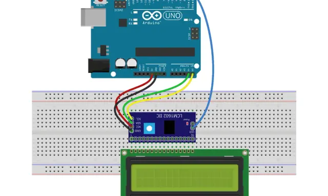 Arduino Uno collegato a un display LCD 16x2 tramite breadboard. Un modulo IIC LCM1602 facilita la connessione.