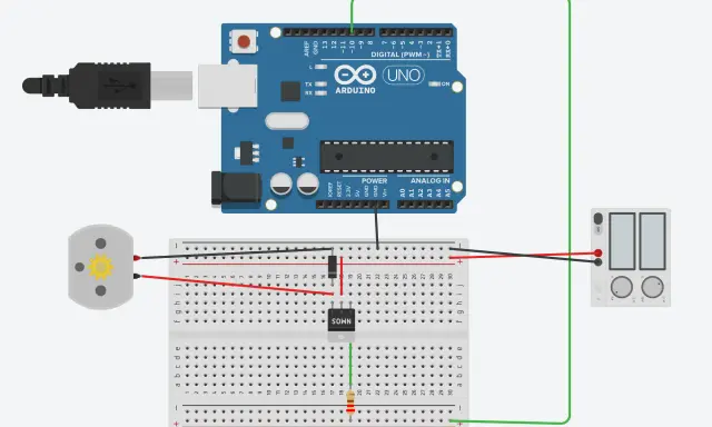 Circuito con Arduino Uno, un motore, un transistor IRFZ44N e un alimentatore.